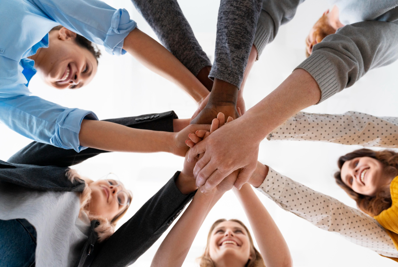 Group of people smiling and interacting